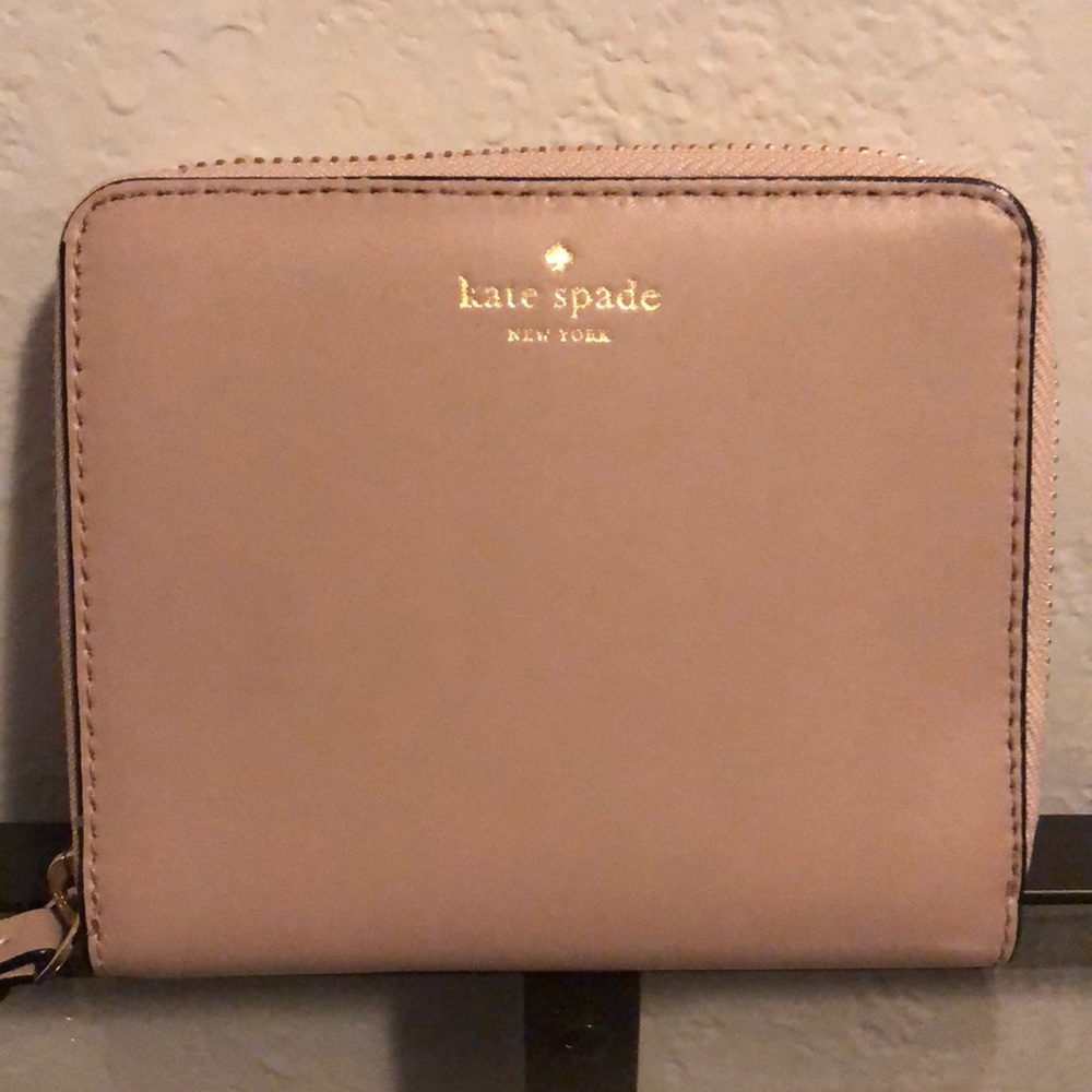 Kate Spade cream bifold wallet